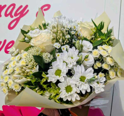 Moonlight Meadow - A beautifully handcrafted bouquet of fresh seasonal blooms in crisp white and soft green tones, creating a timeless gift for any special occasion.